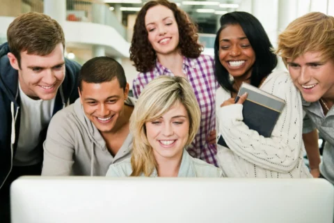 Undergraduates behind monitor